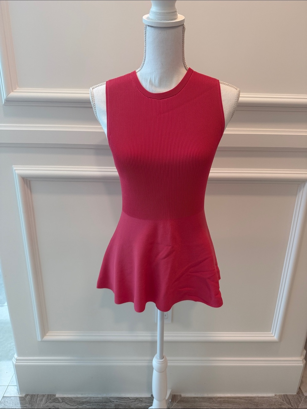 Women’s Sleeveless pink Peplum Knit Top
